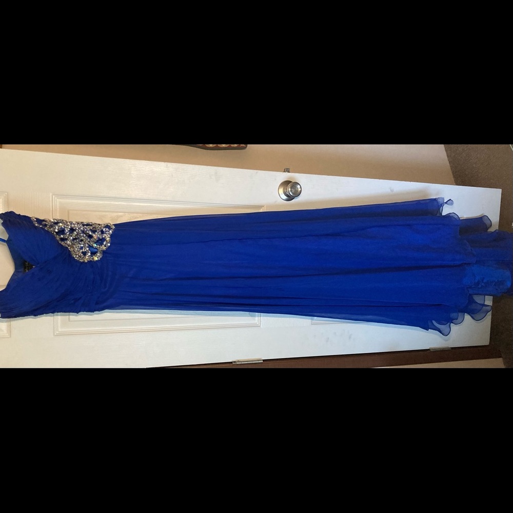 Cassandra stone by Mac Mcduggle. Royal blue formal gown.